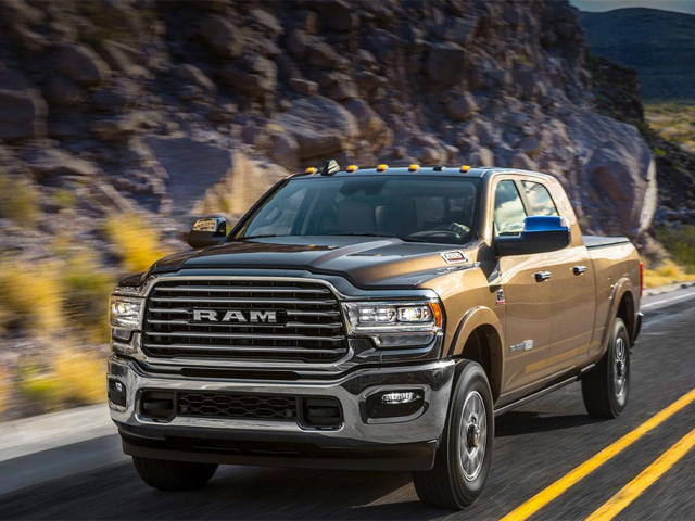 Dodge RAM driving on mountain road